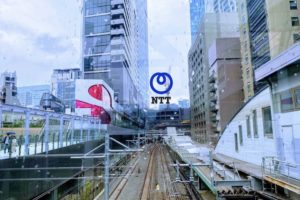 NTT logo & 渋谷桜丘の線路写真